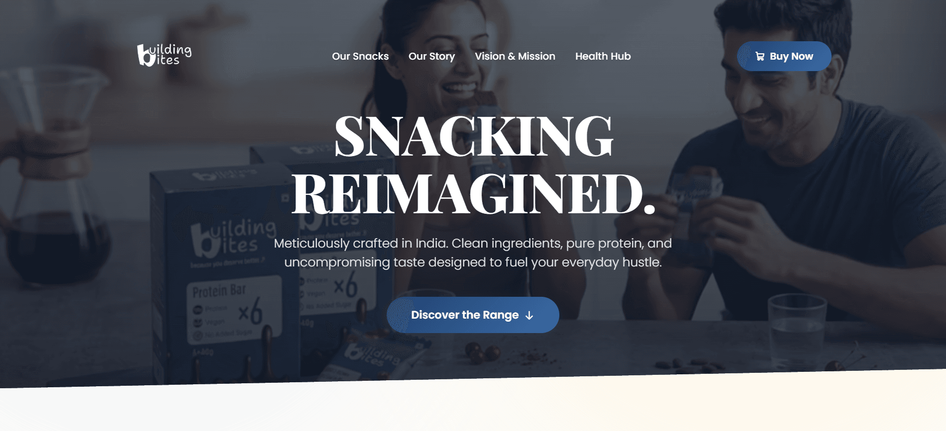 Building Bites clean-label artisan protein snack bars with natural wholesome ingredients on marble.